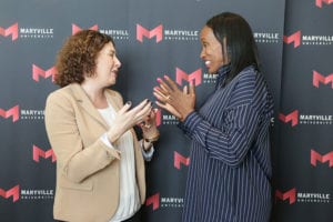 jackie joyner kersee taking interacting  with fans during maryville university leadership event