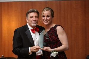 Jenny Bristow receiving Maryville Spirit award from Tom Eschen