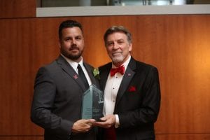 Michael Dragoni receiving Maryville Spirit award from Tom Eschen