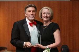 Mary Pfanstiel Heger receiving Maryville Spirit award from Tom Eschen