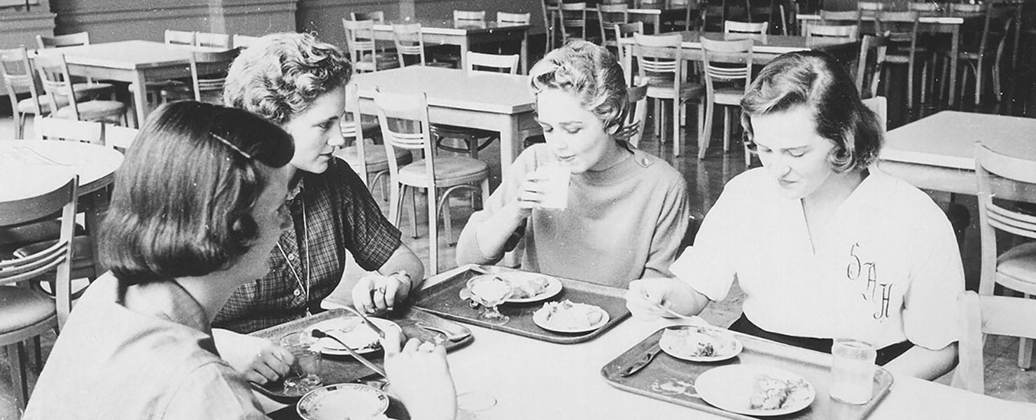 Maryville alums eating lunch in cafeteria during the 70s