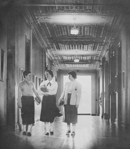 Girls in hall on old campus - from 1953 <em>Promenade</em> yearbook