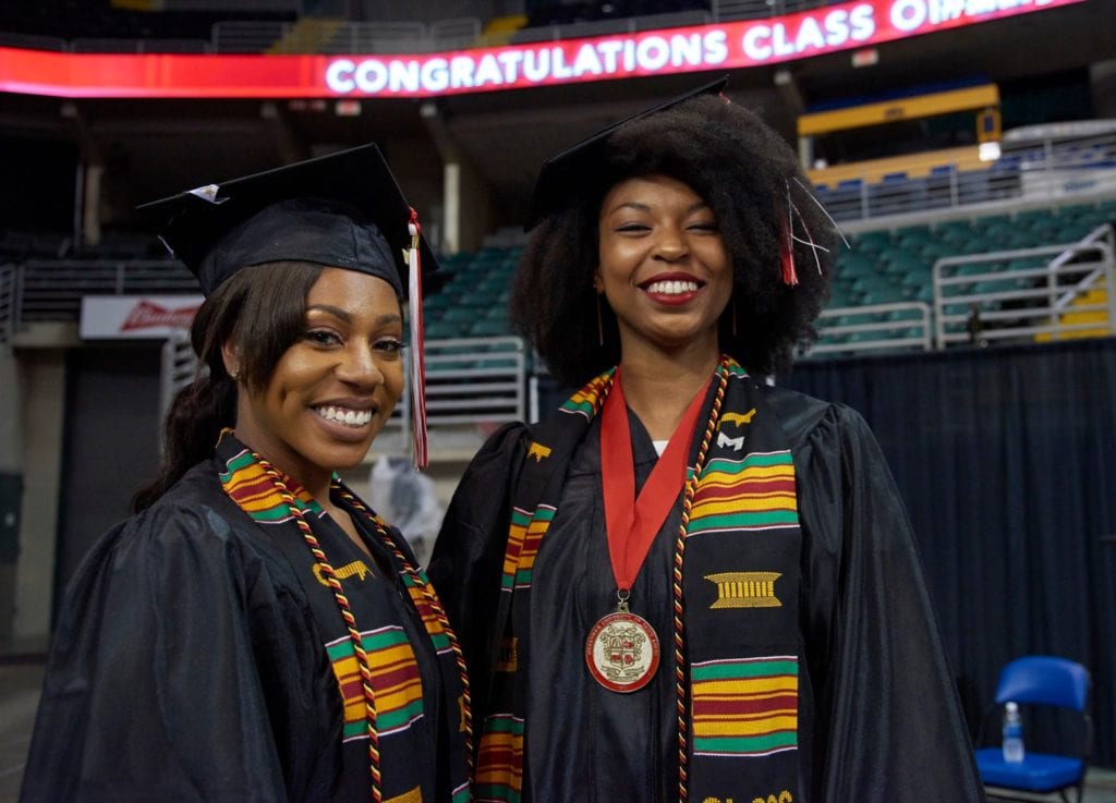 Bascom graduate with friend at commencement