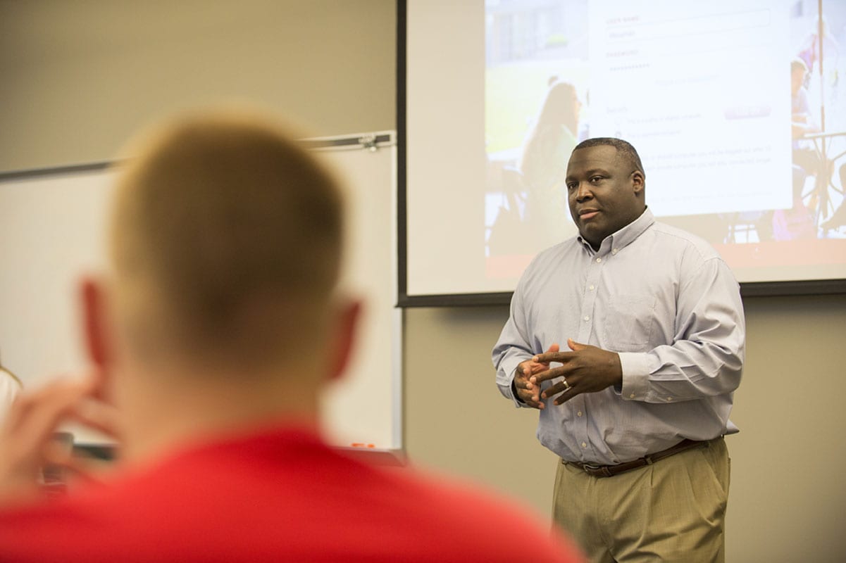 Maryville University Rawlings Sport Management professor Jason Williams in class