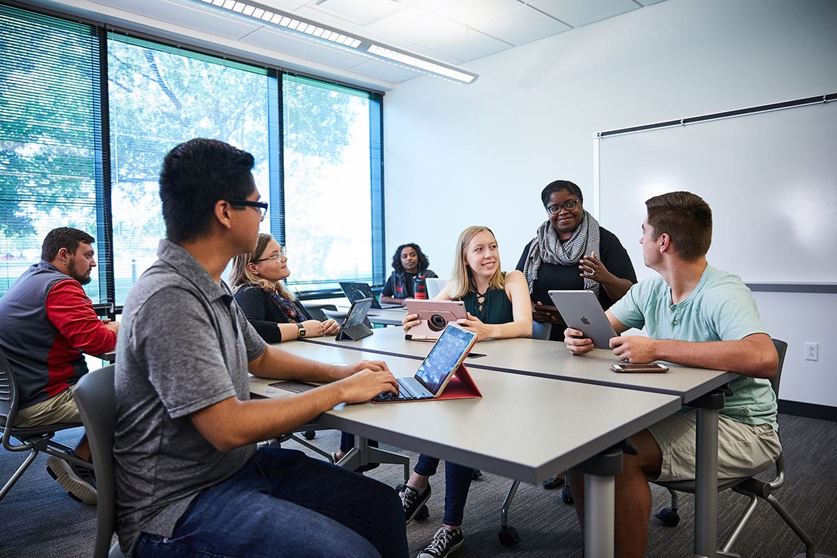 Accounting degree program students collaborating on a project