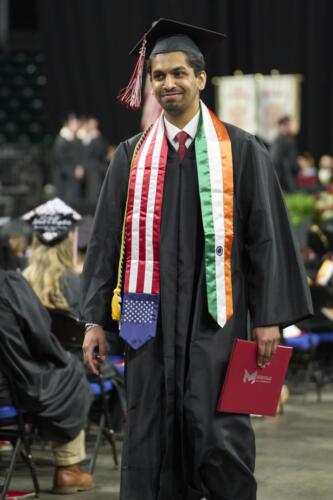 student walking down aisle