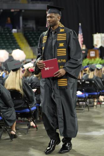 student going back to seat