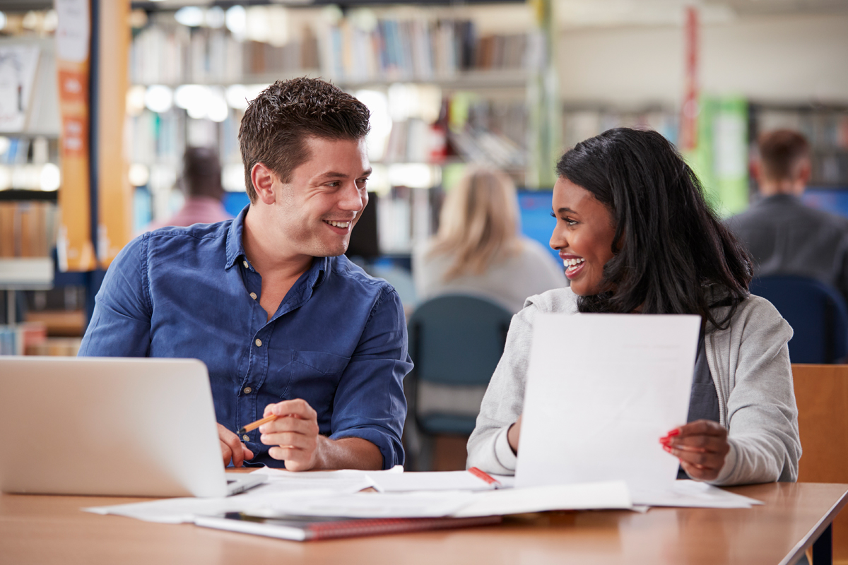 two students discussing work