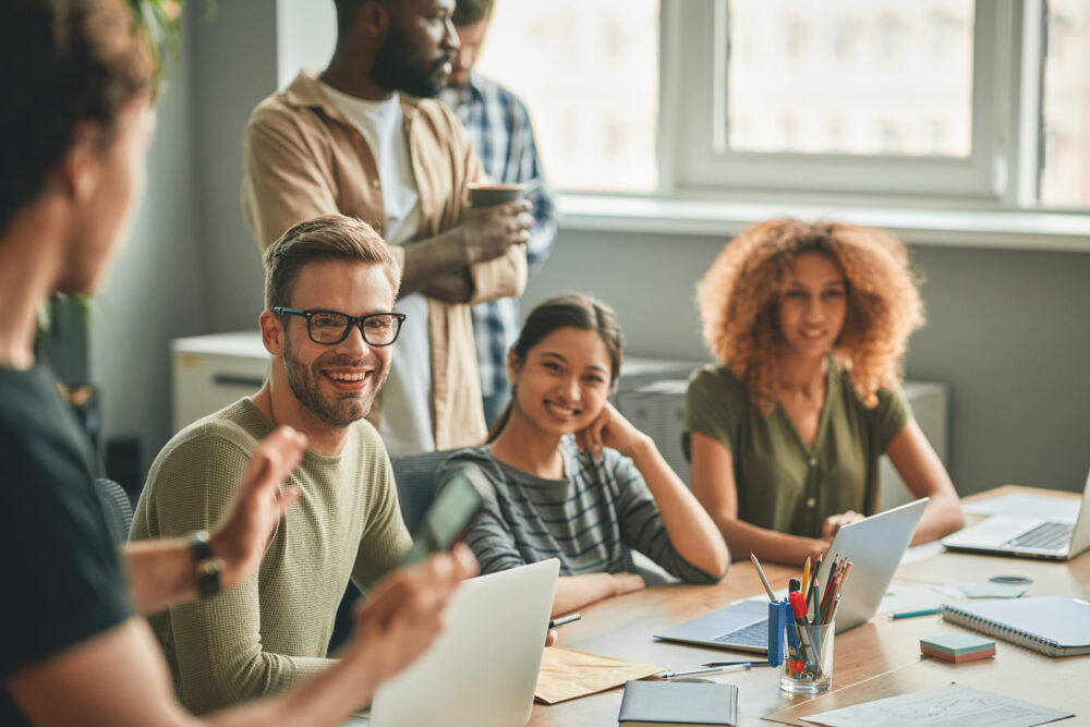 students smiling while learning resume and interview tips