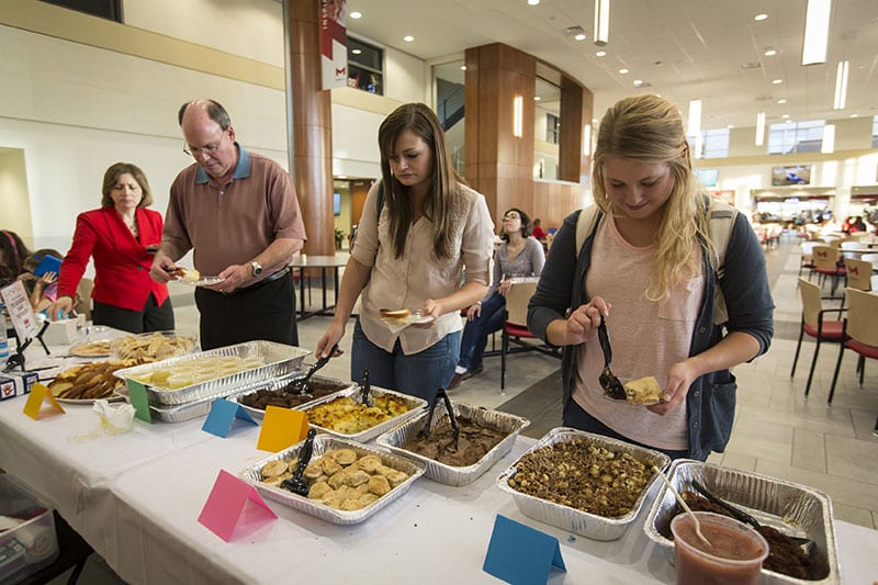 Students trying food at Jewish Food Festival