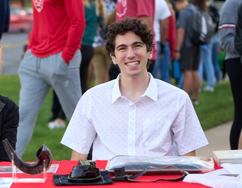 Joey Abeles sitting at table