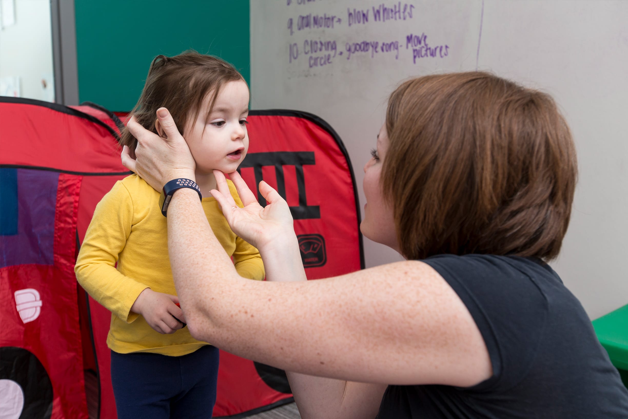 Communication Sciences and Disorders student working with Child