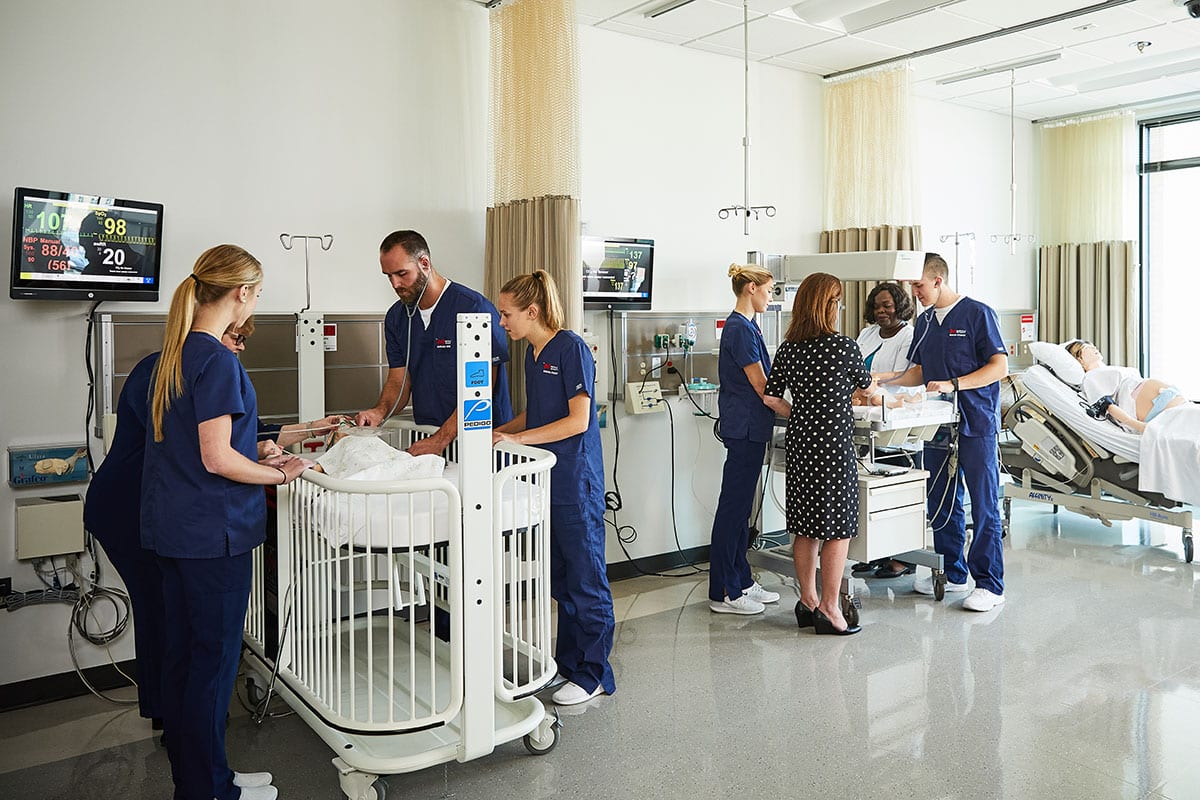 nursing students working in Walker Hall lab