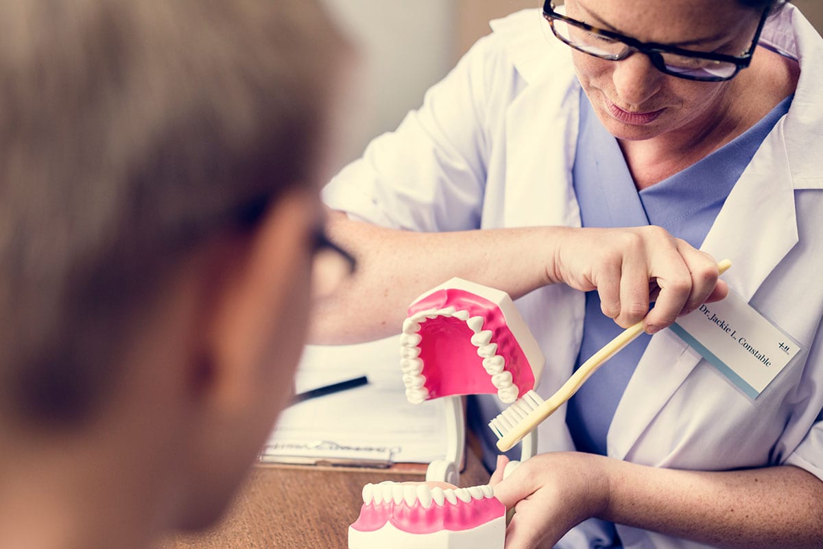 student in a dentistry class