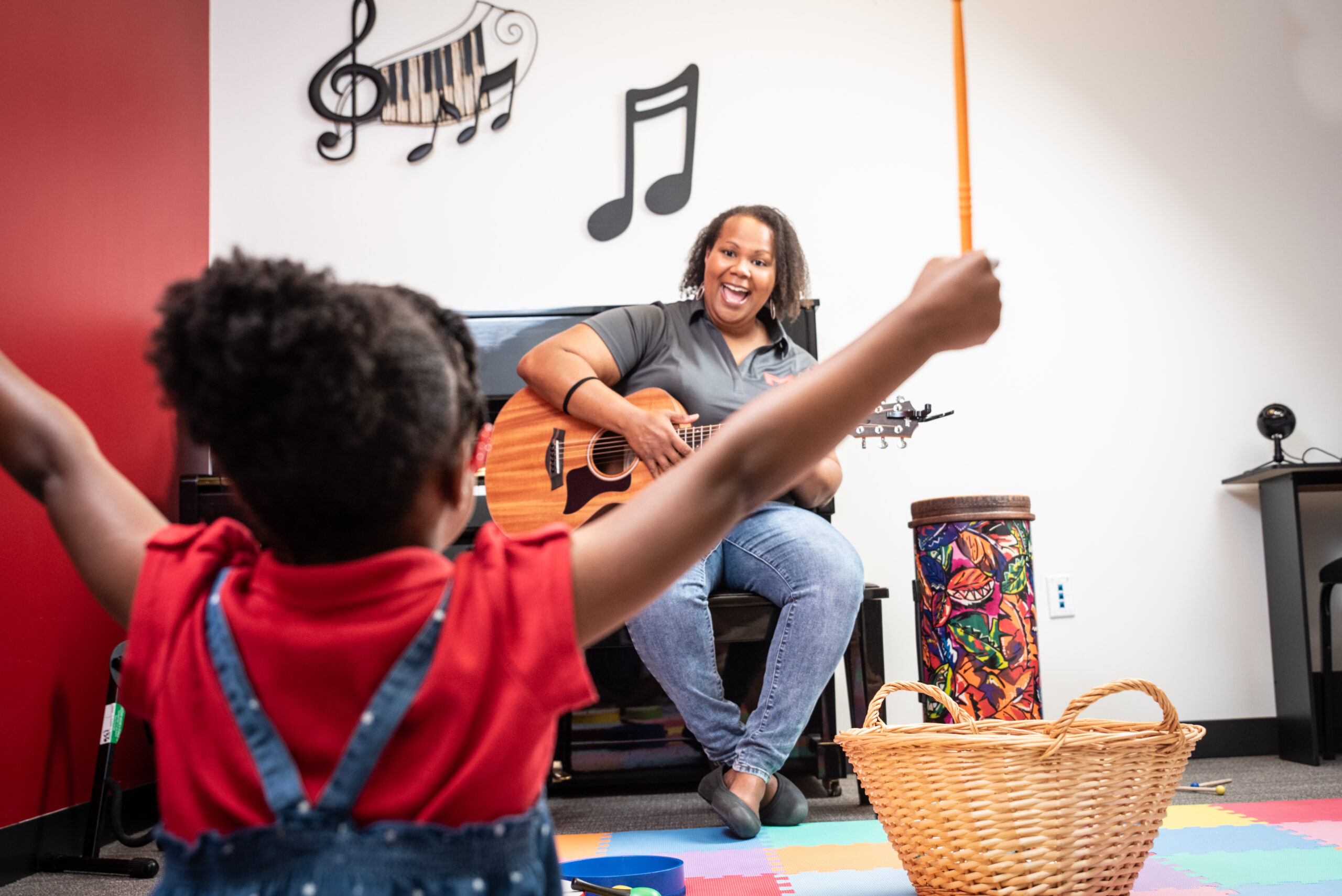 Maryville University music therapy student working with a patient