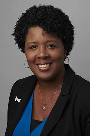 headshot of April Santos
