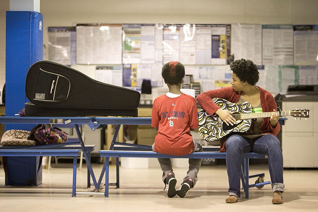 music therapy student working with a middle school student