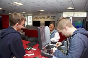 Maryville University Students work at the Tech Bar as part of the Cyber Fusion Center