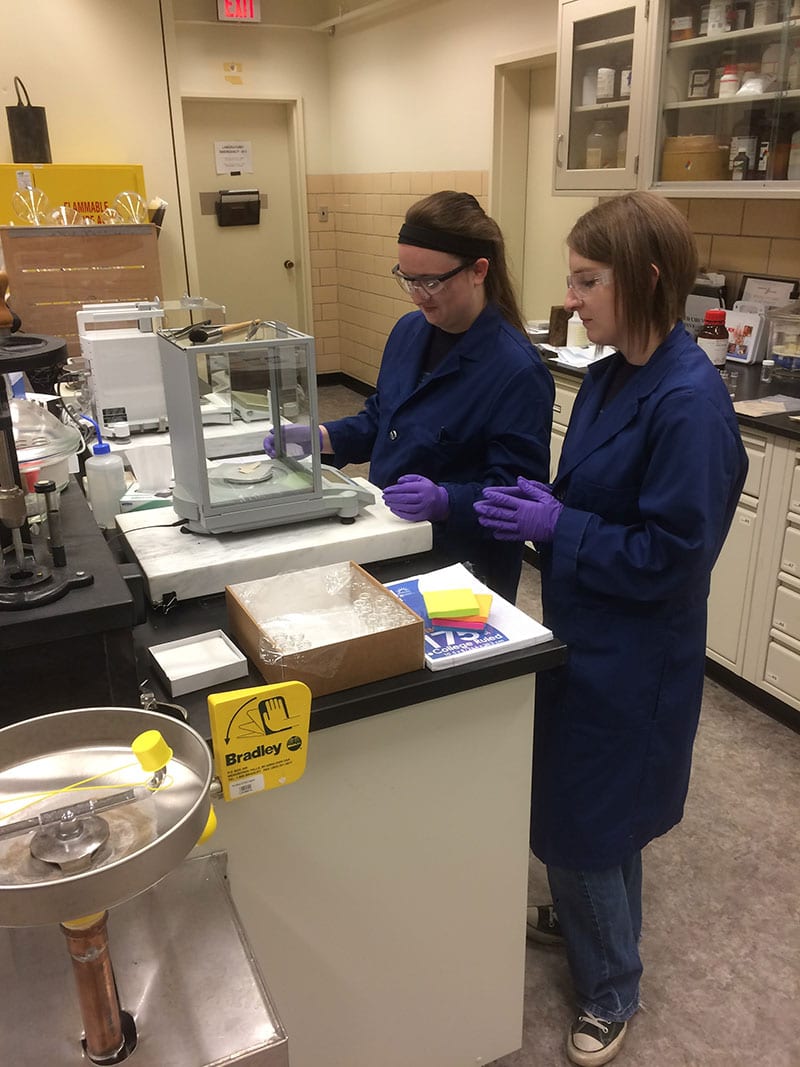 Forensic science majors, Katie Agosta and Kelsey Vancil, demonstrated forensic science skills to lab managers at the Library of Congress