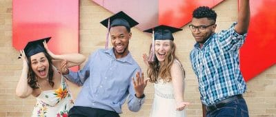 students celebrating graduation