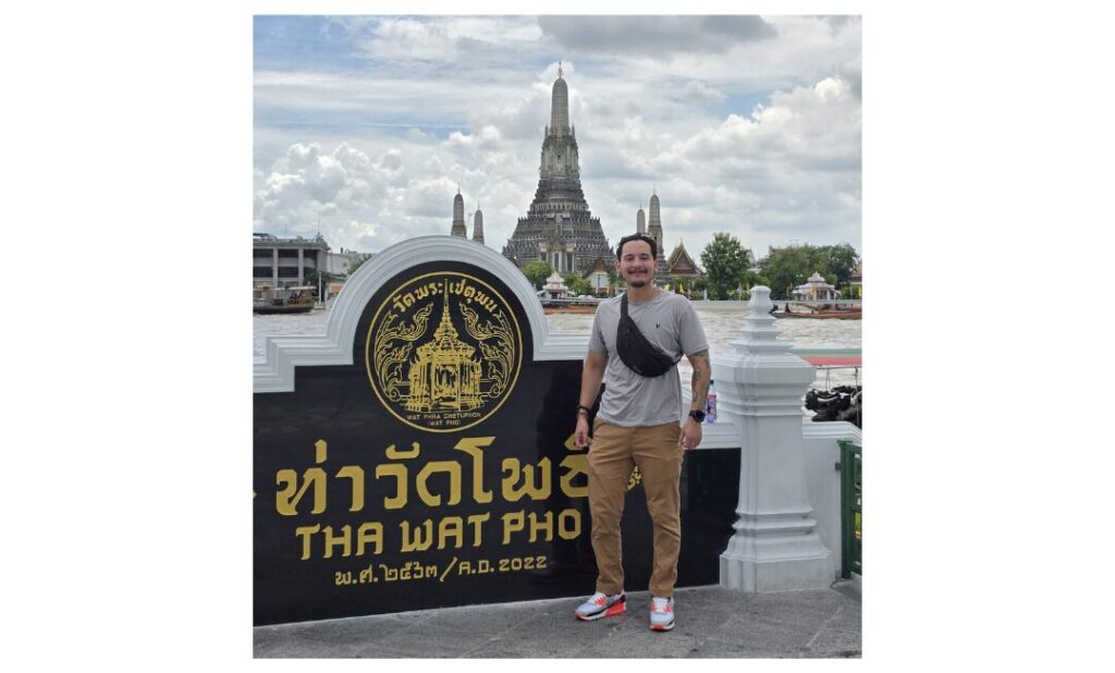 Will Solomon outside Wat Arun, a Buddhist temple in Bangkok, Thailand.
