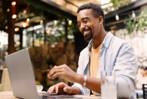 Representation of person working on computer with LaunchCode at Maryville University