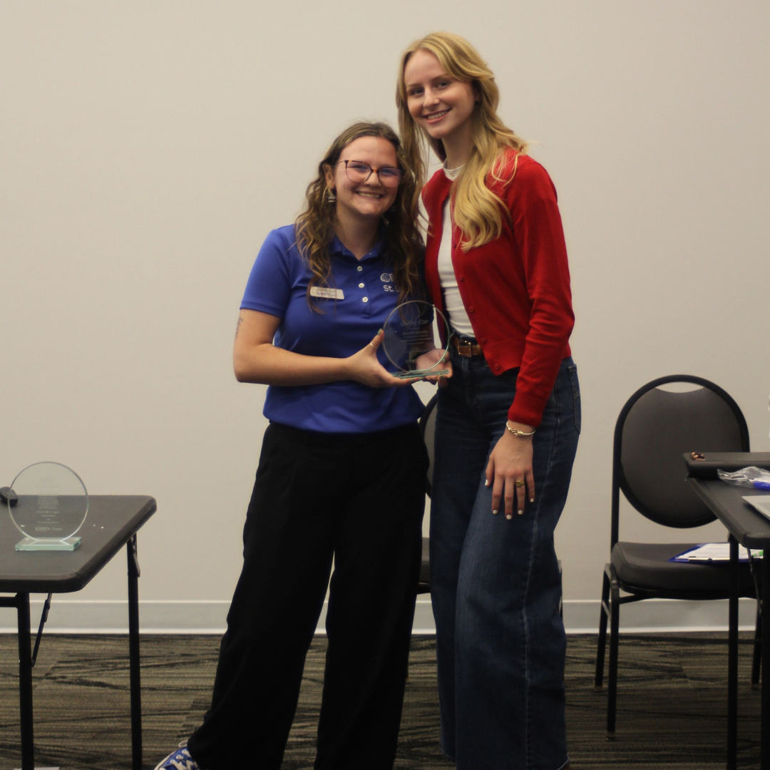 Cadie Buschjost poses with Kennedy Yowell, Volunteer & Program Coordinator for NAMI St. Louis after being presented with the award for Chapter of the Year