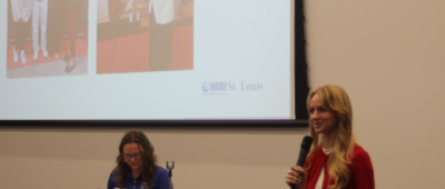 Cadie Buschjost accepts award on behalf of Maryville University for NAMI Chapter of the Year