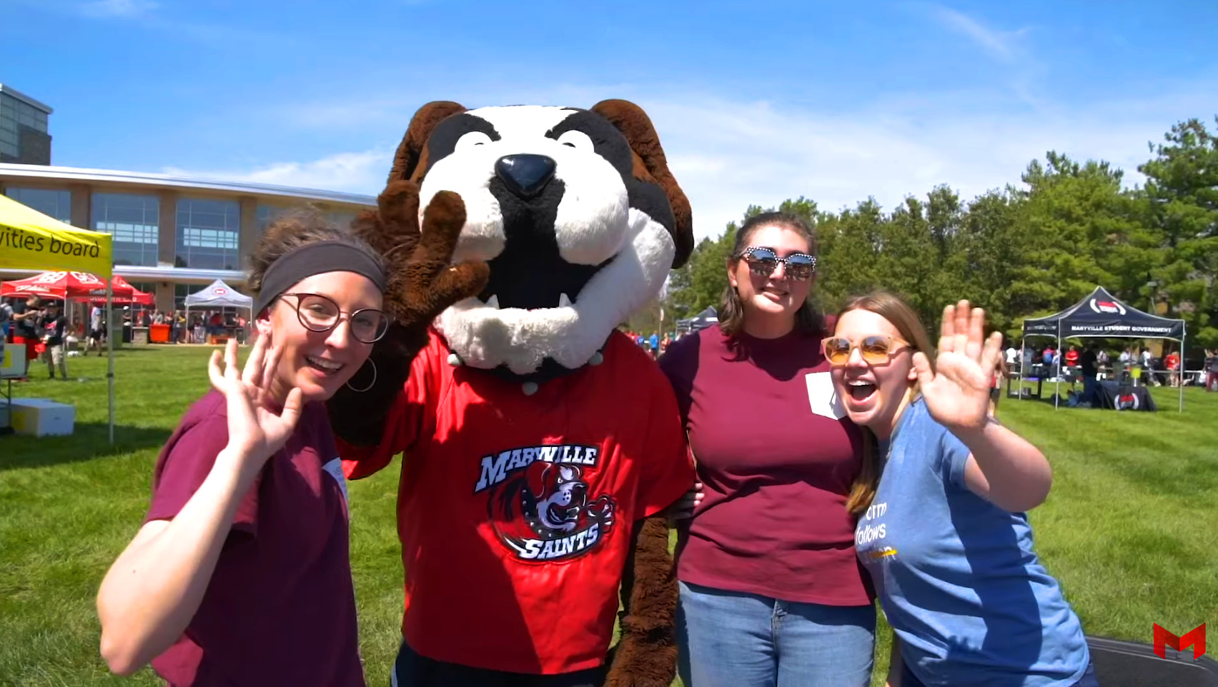 Maryville students and Louie saying hello