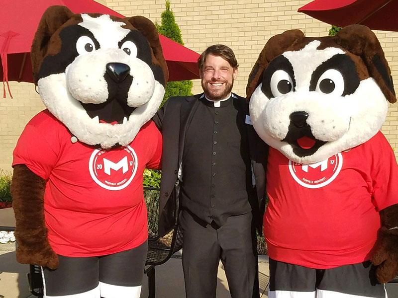 Father Waldman with Maryville mascots