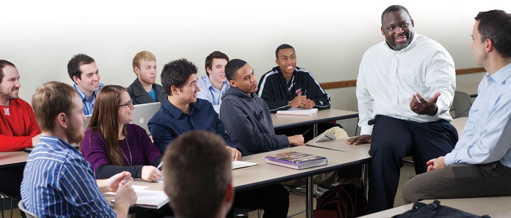 jason williams in class with students