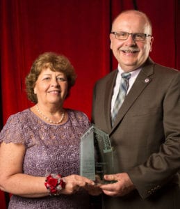 Christine Crain accepting Spirit of Maryville award from Chuck Gulas