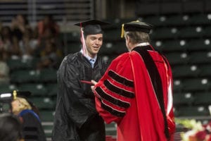 Mark Cohen receiving diploma