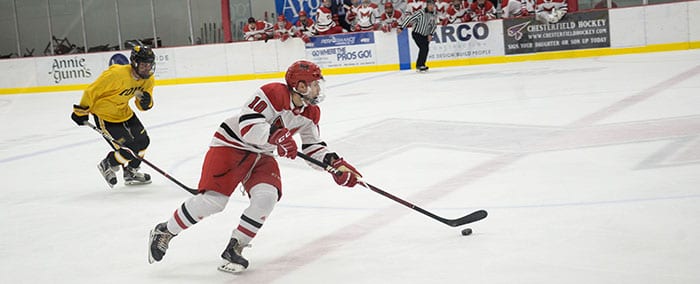 Maryville hockey player skating with puck