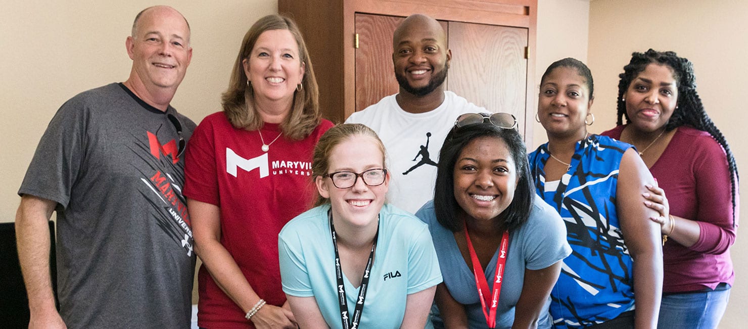 parents with their students on move in day