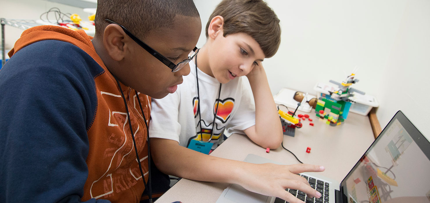 students working on robot