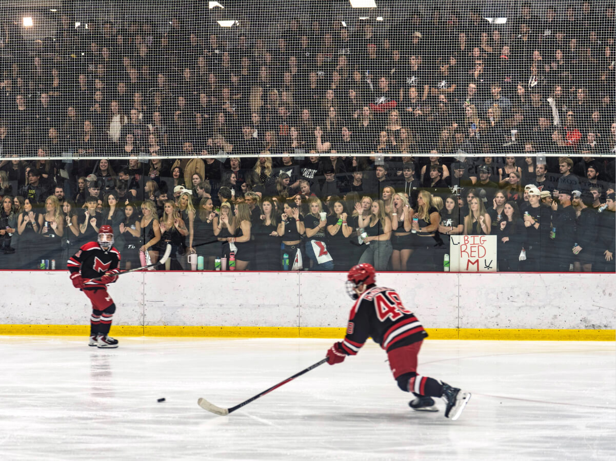 Maryville Saints men&rsquo;s hockey players on the ice.