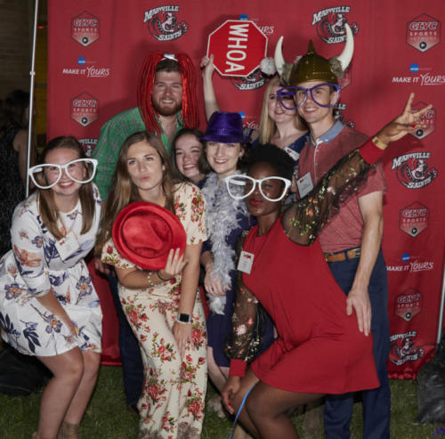 Students posing at homecoming