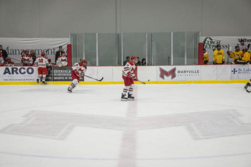 Maryville ice hockey players in a game against Michigan.